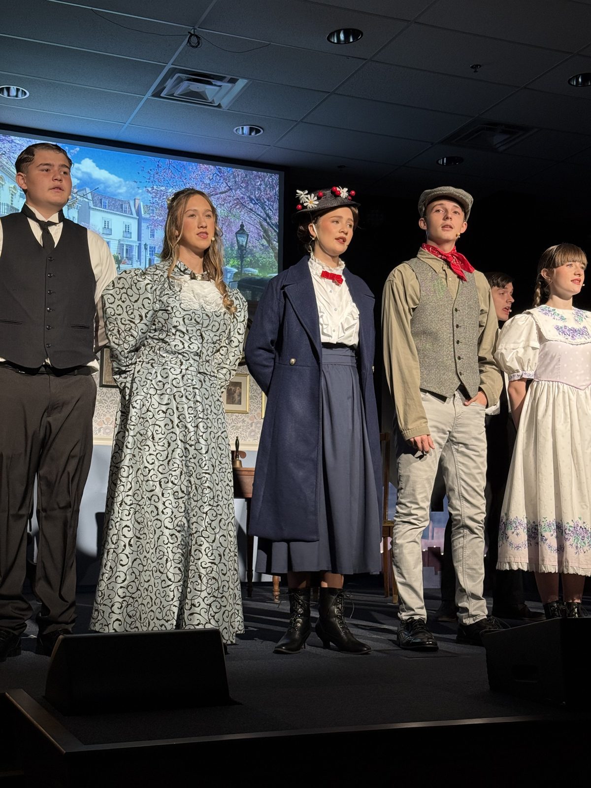 The Mary Poppins cast in costume